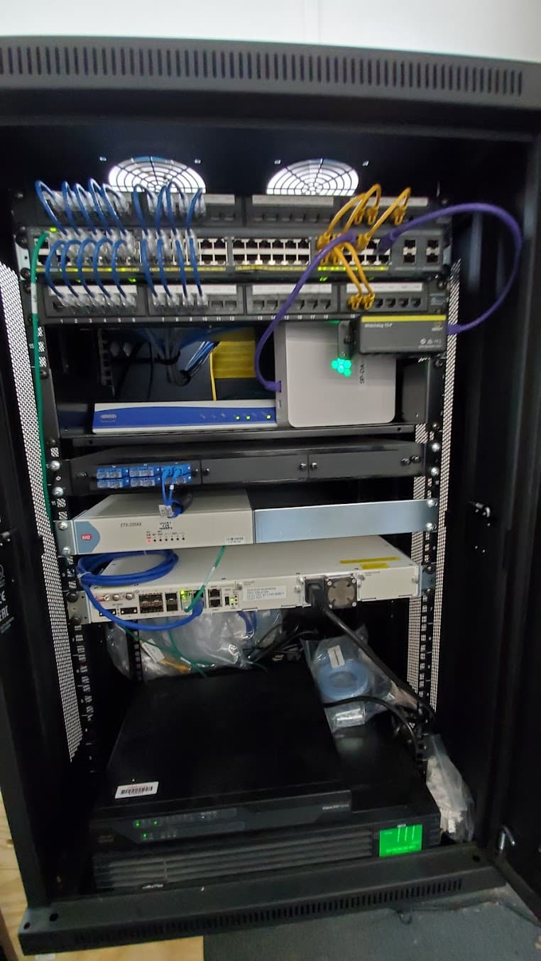A network rack with patched cabling and switches